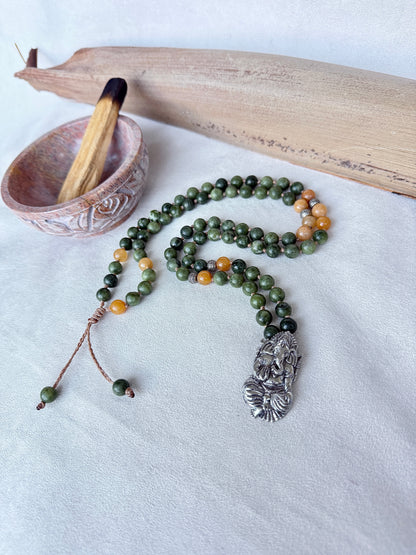 Short mala necklace coiled to show 31.5 inch length and balanced color pattern Ganesha pendant for abundance