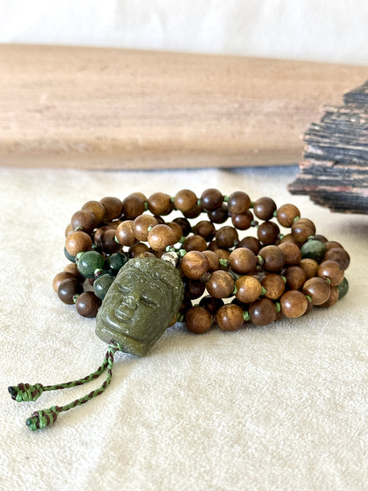 Samdea Mala sandalwood necklace with 108 hand-knotted beads, Indian agate, and a hand-carved jade Buddha pendant