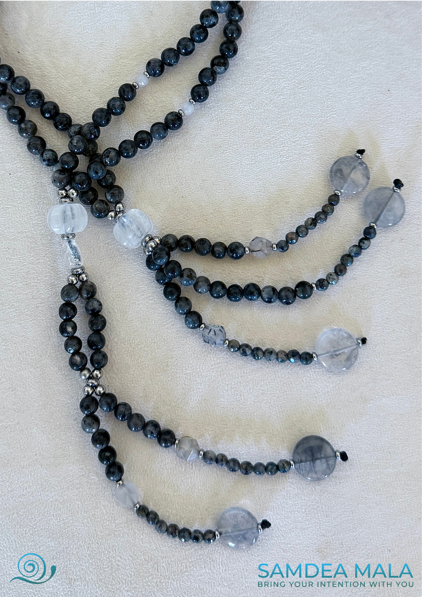 Gray SGI juzu with tassels close up