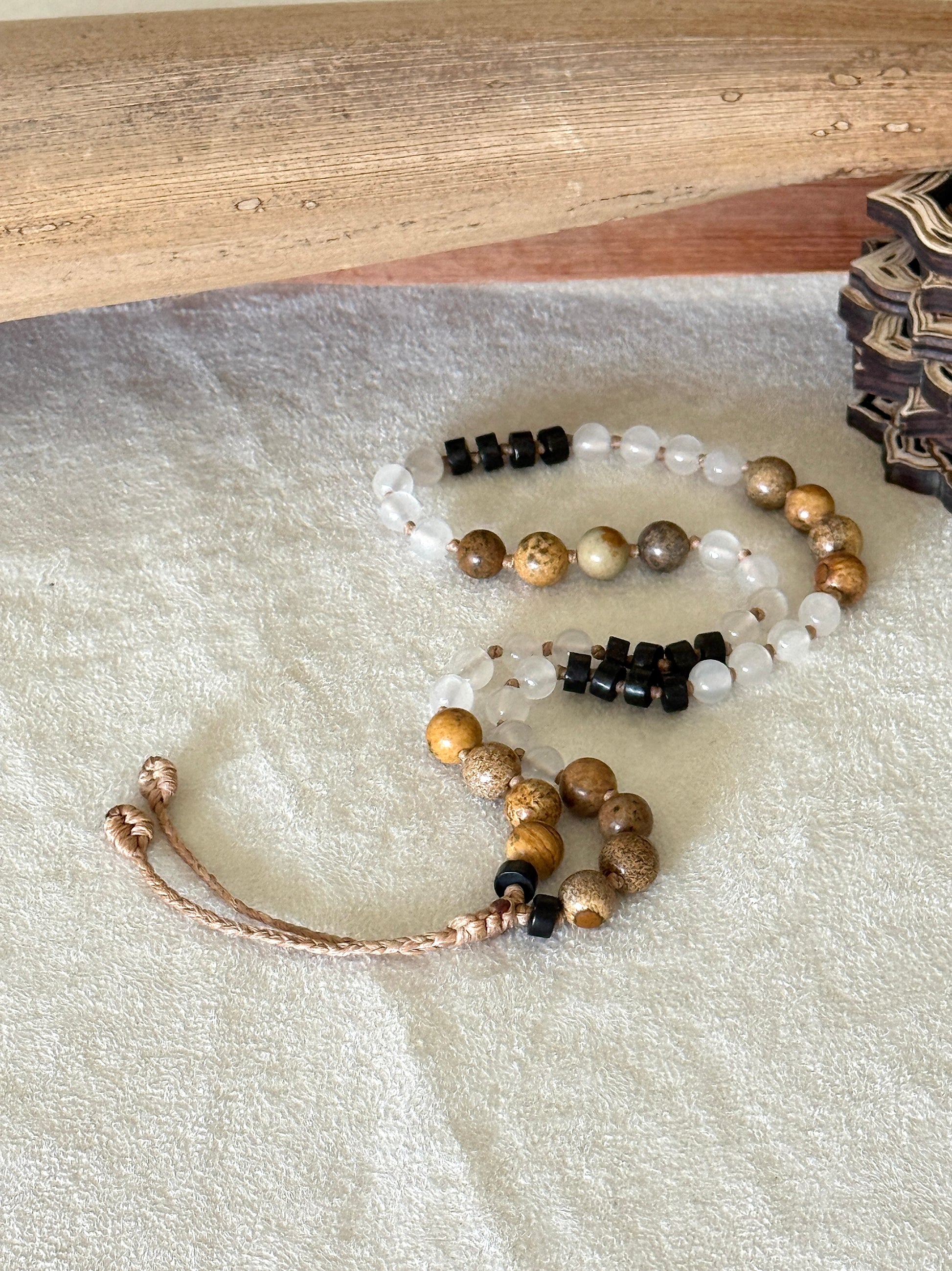 Grounding natural gemstone obosidian, selenite, jasper breathing mala  bracelet with groups of four beads to guide inhale, hold, exhale, and hold during breathwork practice.