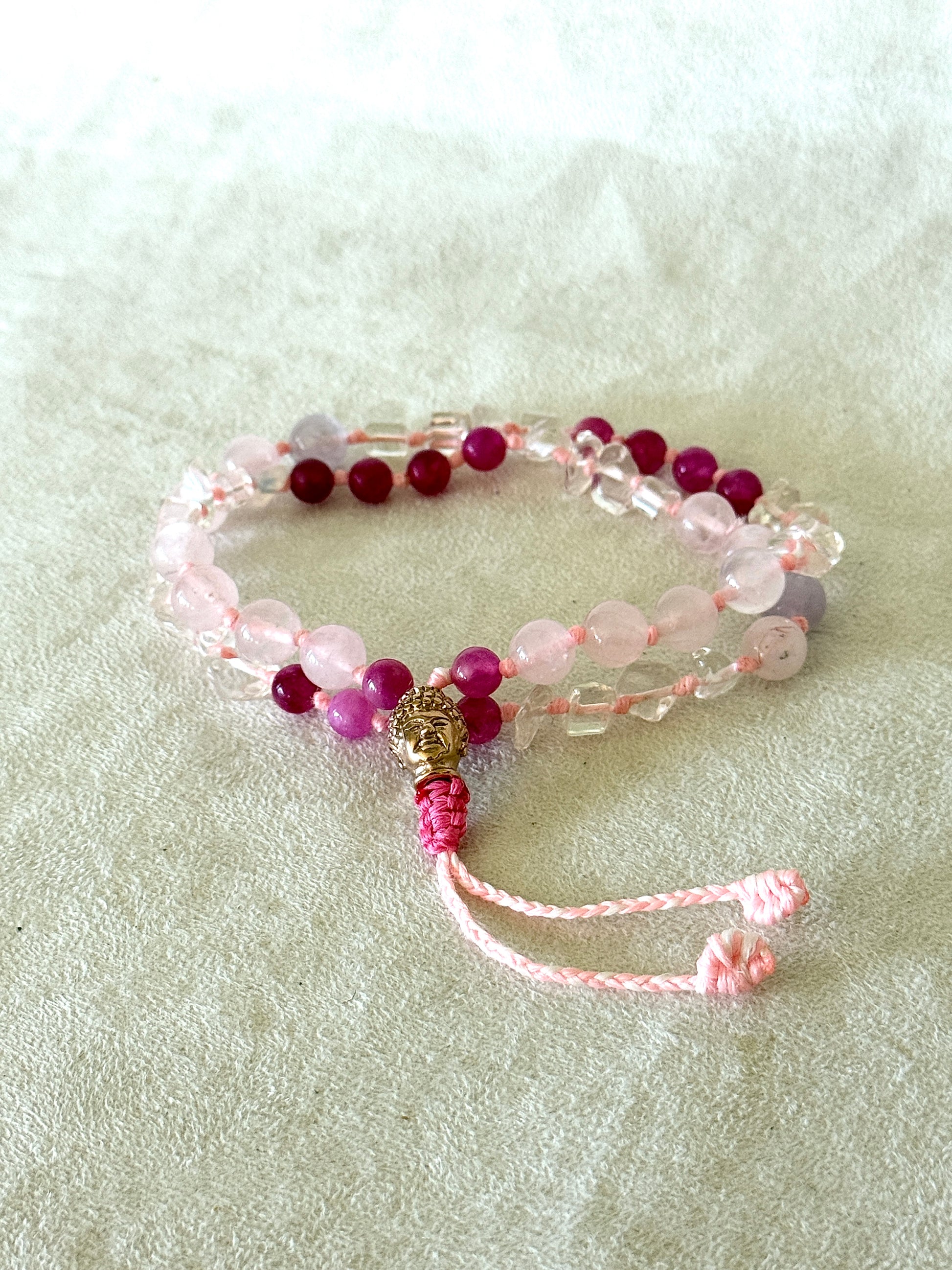 Handmade adjustable Square Breathing Mala with pink agate, rose quartz, clear quartz, and a rose-gold-colored stainless steel Buddha head meru, designed for box breathing, meditation, and mindful pauses.