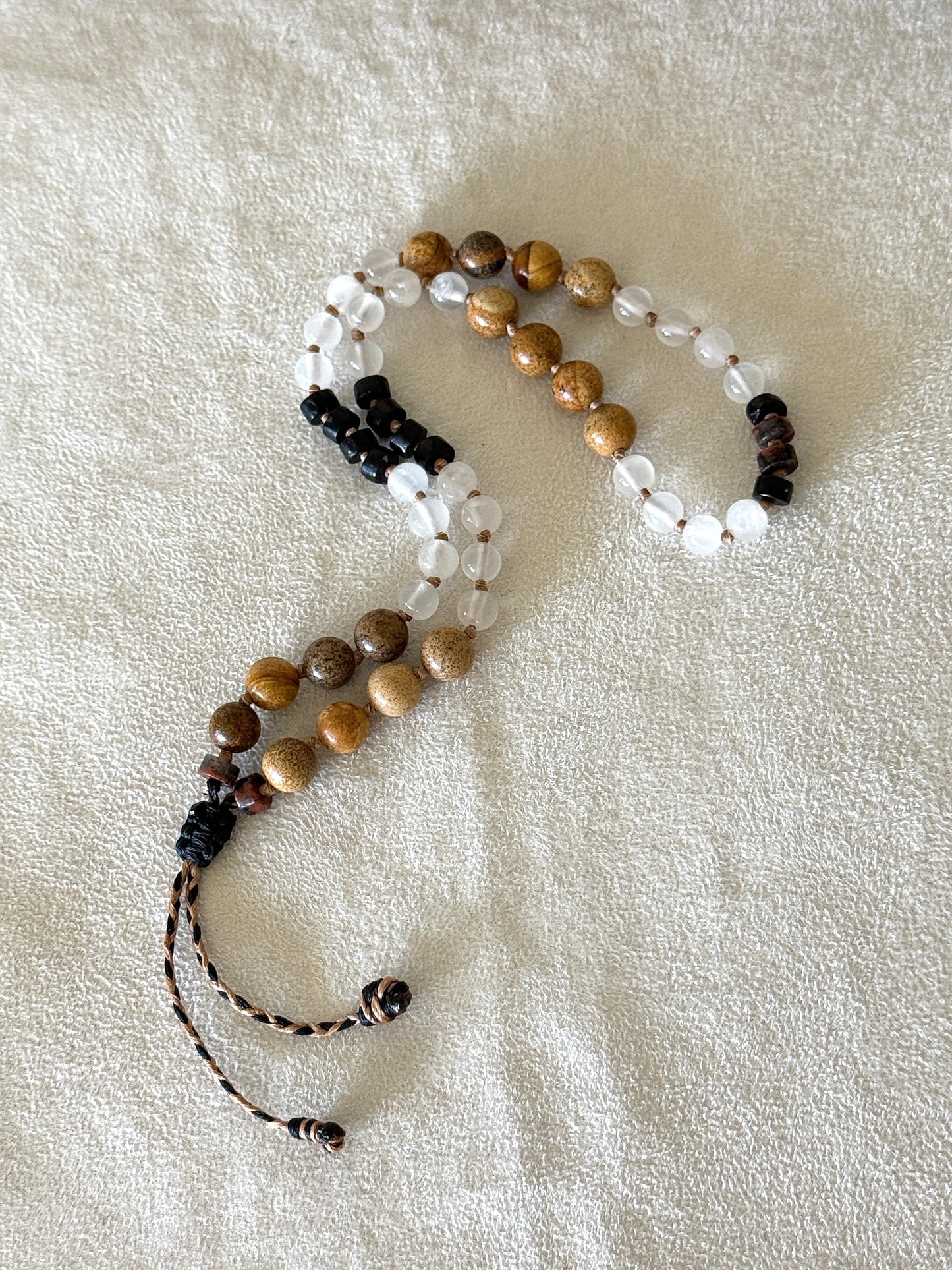 Natural gemstone obosidian, selenite, jasper breathing mala  bracelet with groups of four beads to guide inhale, hold, exhale, and hold during breathwork practice.