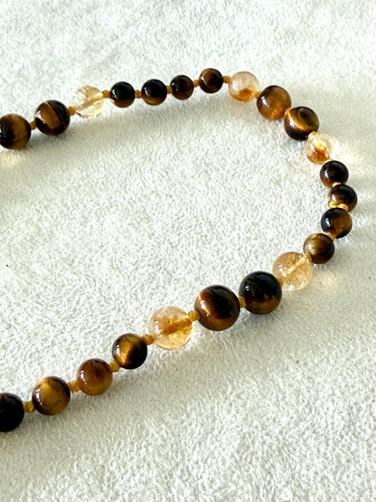 Handmade Box Breathing Mala with tiger's eye and citrine, featuring a natural soap-berry seed meru, designed for box breathing, meditation, and a return to your own center.