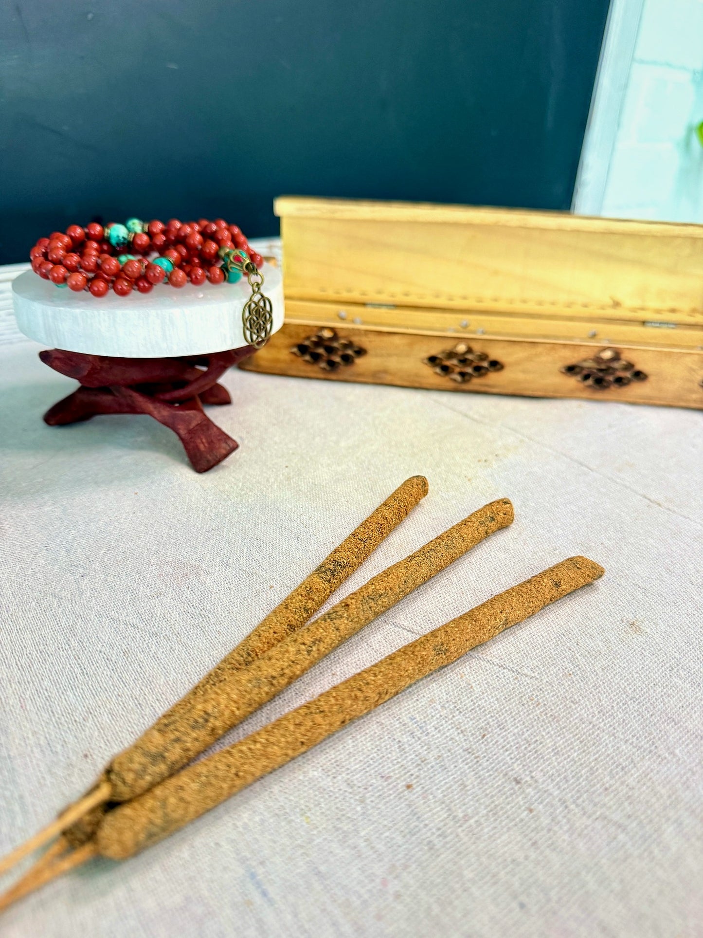 masala naturalartisan hand-rolled in India, natural non-toxic ingredients. Resin rolled incense stick texture detail showing herbal blend and artisan hand rolled Nag Champa tradition