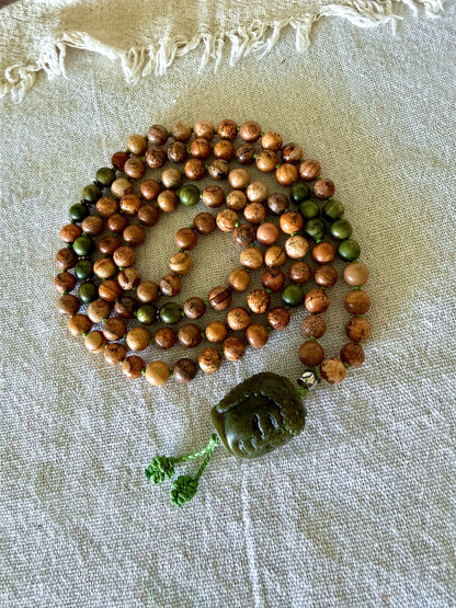 108 bead mala for meditation with genuine sandalwood, sand jasper gemstones, and Jade Buddha pendant