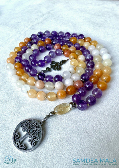 Hand-knotted mala necklace with topaz jade and amethyst, citrine meru bead for joy and expansion