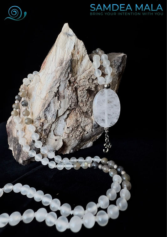 Samdea Mala with selenite, labradorite, and clear quartz in natural light for protection and clarity. 108 prayer beads mala necklace. Custom Mala for Meditation and protection.