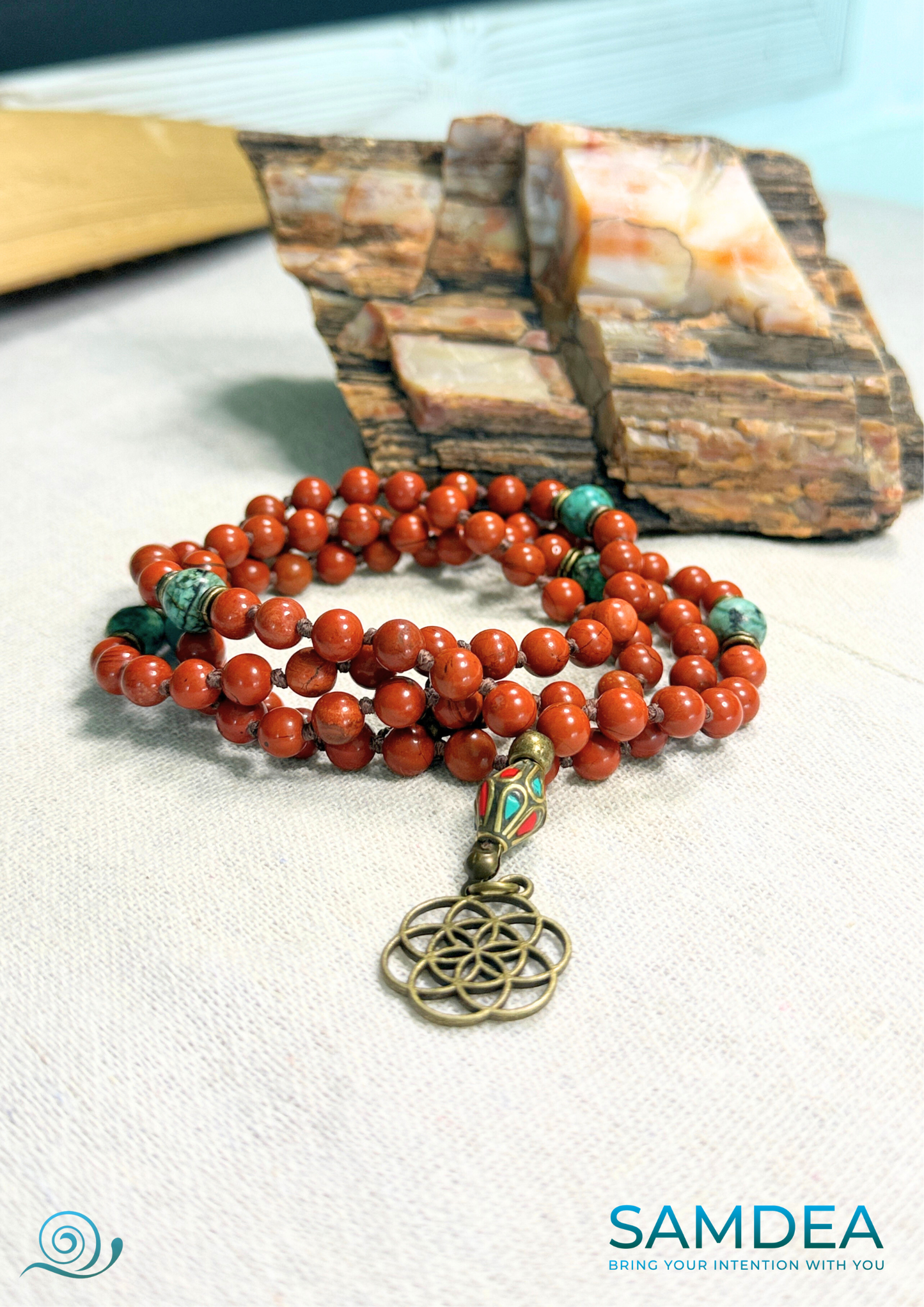 Mala for meditation with Red Jasper and African Turquoise, hand-knotted with 108 beads for meditation and personal growth. Spiritual jewelry for grounding, strength, and transformation. Seed f life pendant.