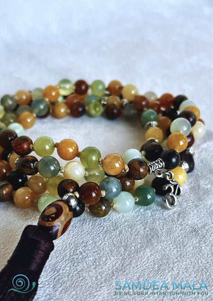 Samdea Mala – Jade Xiuyan mala beads with soft earth colours with tassel and small om charm