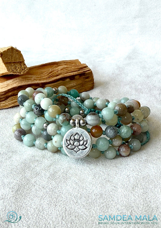 Mala bracelet in Amazonite with natural gemstones – a custom spiritual bracelet for meditation and intentions. Handmade Tibetan-style multi-loop bracelet by Samdea Mala.