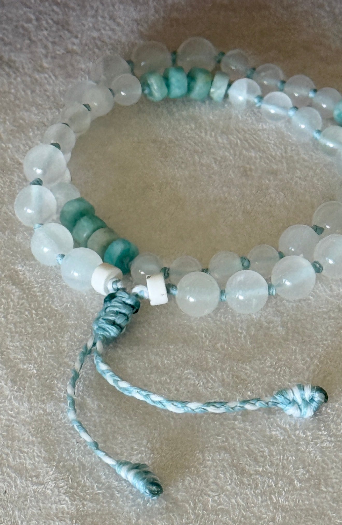 Natural gemstone box breathing mala with groups of four beads to guide inhale, hold, exhale, and hold during breathing practice. Detail