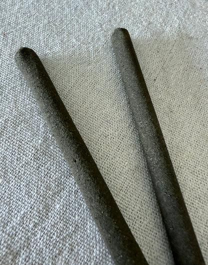 close up of Natural hand rolled non toxic incense sticks made with herbs and resins for mental clarity and energetic cleansing