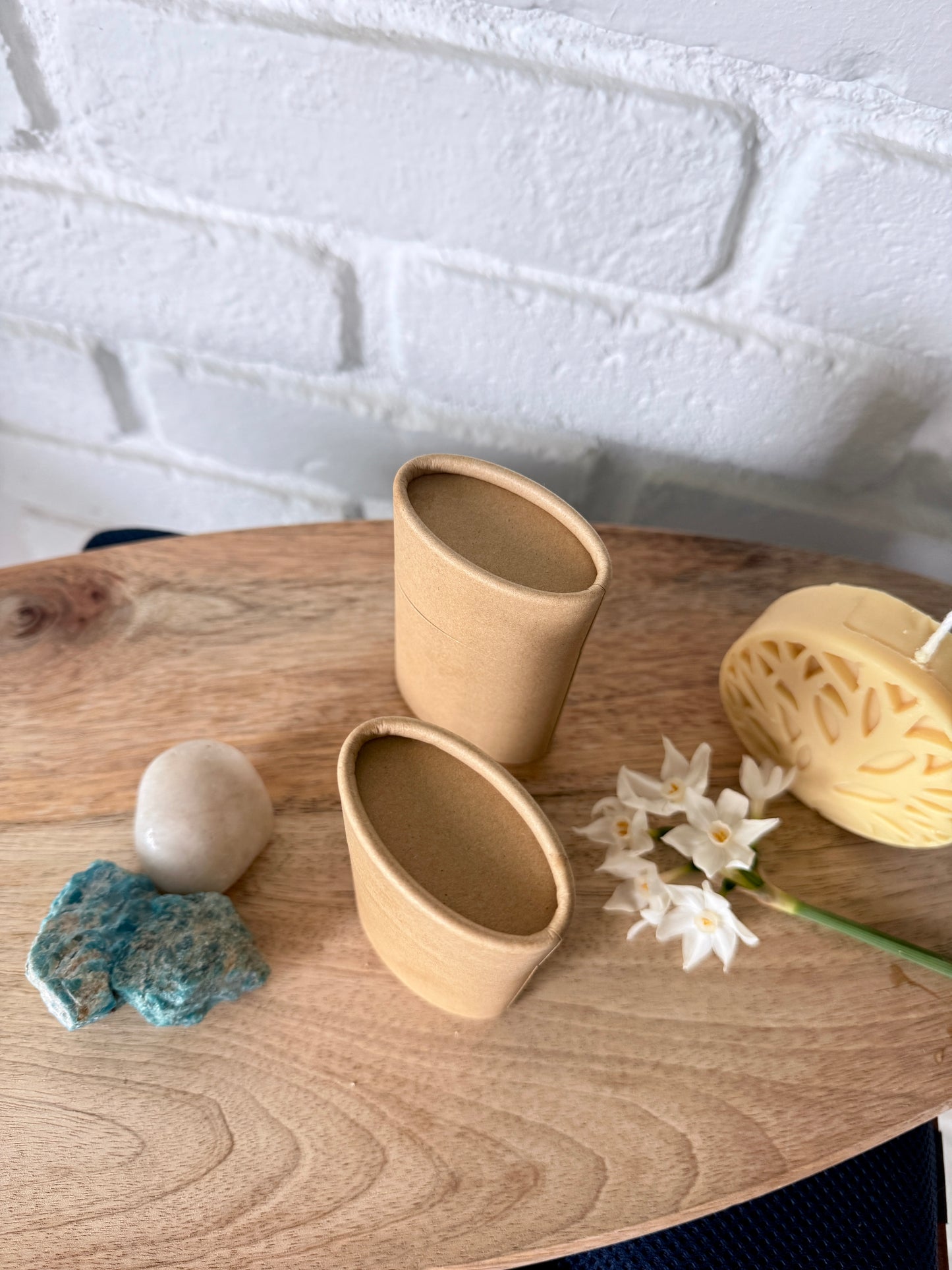 Two natural deodorant sticks on neutral background, plastic-free vegan body care