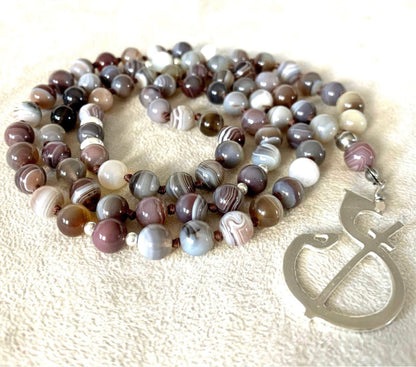 Odaka Yoga - The Symbol - necklace - Francesca Cassia e Roberto Milletti silver pendant on a custom mala necklace for meditation