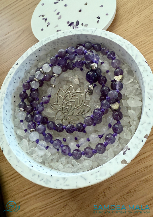 Samdea Mala purifying and charging bowl with natural selenite, amethyst, and quartz crystals - detail with amethyst mala and lotus flower pendant