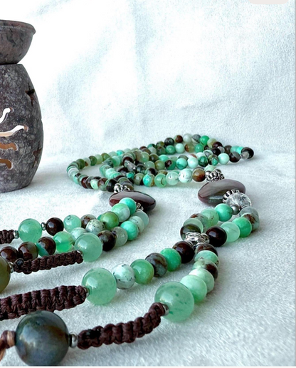 Green Chrysoprase SGI Nichiren juzu prayer beads, full view on white background