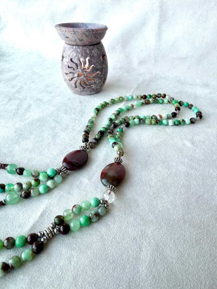 Close-up of natural green chrysoprase beads on SGI Nichiren juzu