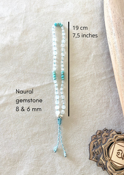Measures of Howlite, Selenite, and Amazonite box breathing mala in natural gemstones, designed to guide mindful breathing and self-regulation through touch.