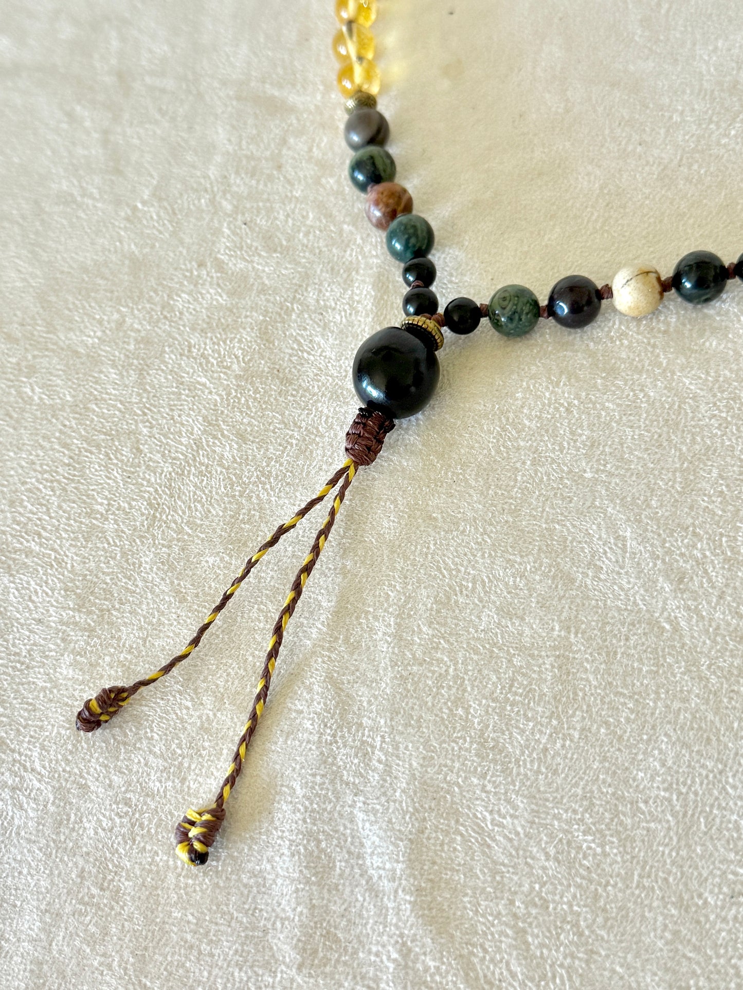 Soapberry on a Breathwork Handmade Pause Breathing Mala with natural gemstone beads, designed to guide a 4–2–6 breathing practice through touch without the need to count.