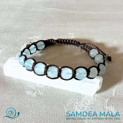 Samdea Mala Tibetan aquamarine bracelet for emotional balance and peace, featuring clear blue gemstone beads.