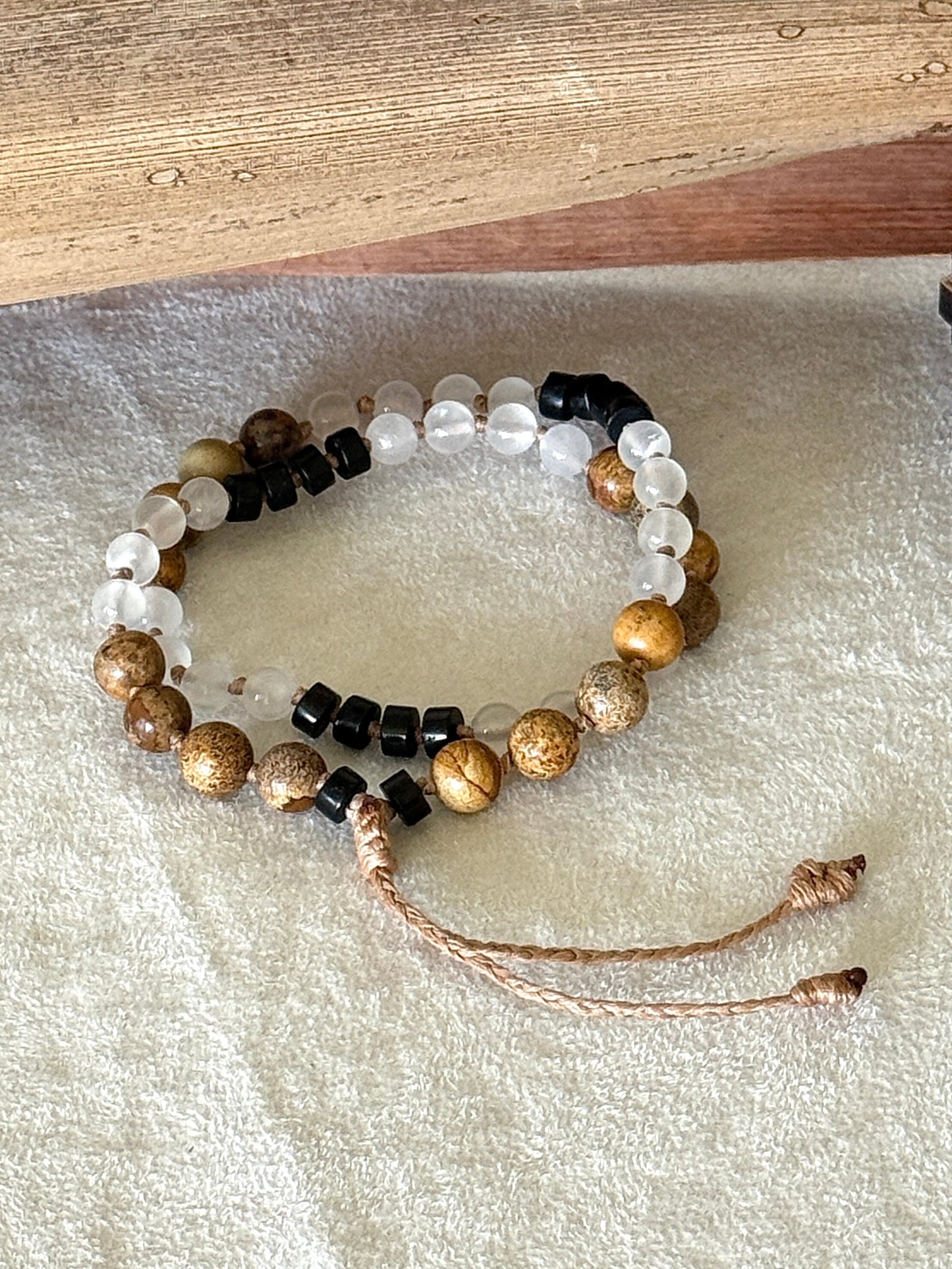 Grounding natural gemstone obsidian, selenite, jasper for breathwork. Mala  bracelet with groups of four beads to guide inhale, hold, exhale, and hold during breathingp ractice.