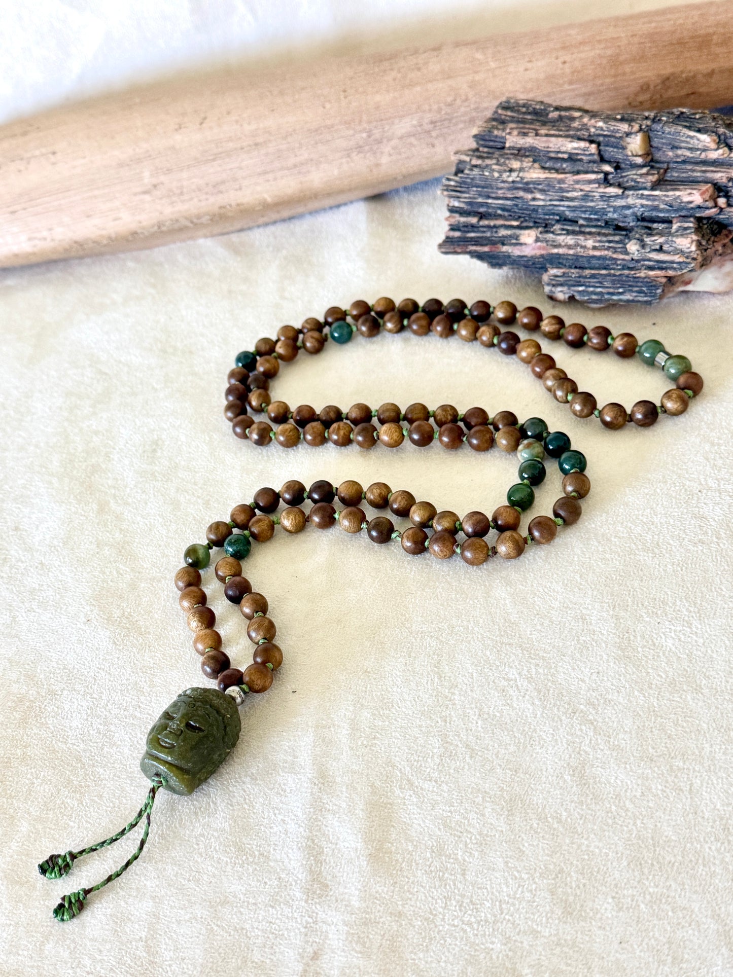 Full-length view of the 108-bead sandalwood and Indian agate mala necklace
