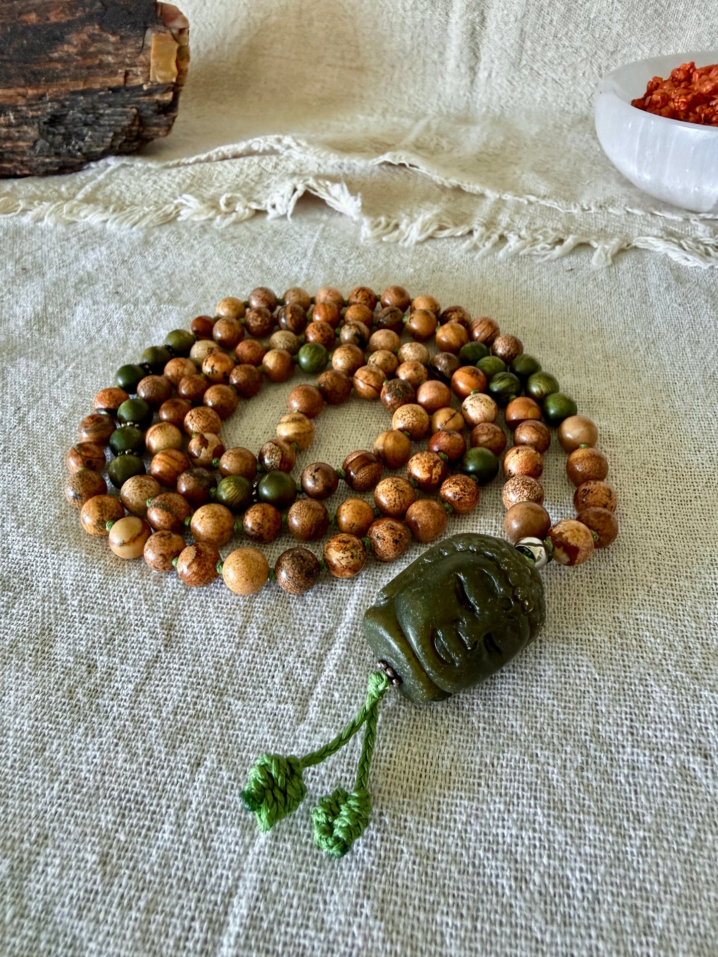 mala beads for meditation Samdea Mala with authentic sandalwood beads, sand jasper, and hand-carved Jade Buddha pendant for meditation and spiritual practice