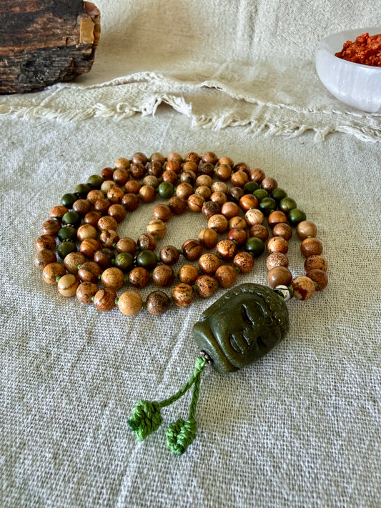 mala beads for meditation Samdea Mala with authentic sandalwood beads, sand jasper, and hand-carved Jade Buddha pendant for meditation and spiritual practice