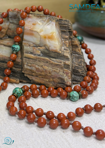 beads detail of Mala for meditation with Red Jasper and African Turquoise, hand-knotted with 108 beads for meditation and personal growth. Spiritual jewelry for grounding, strength, and transformation. Seed of life pendant.