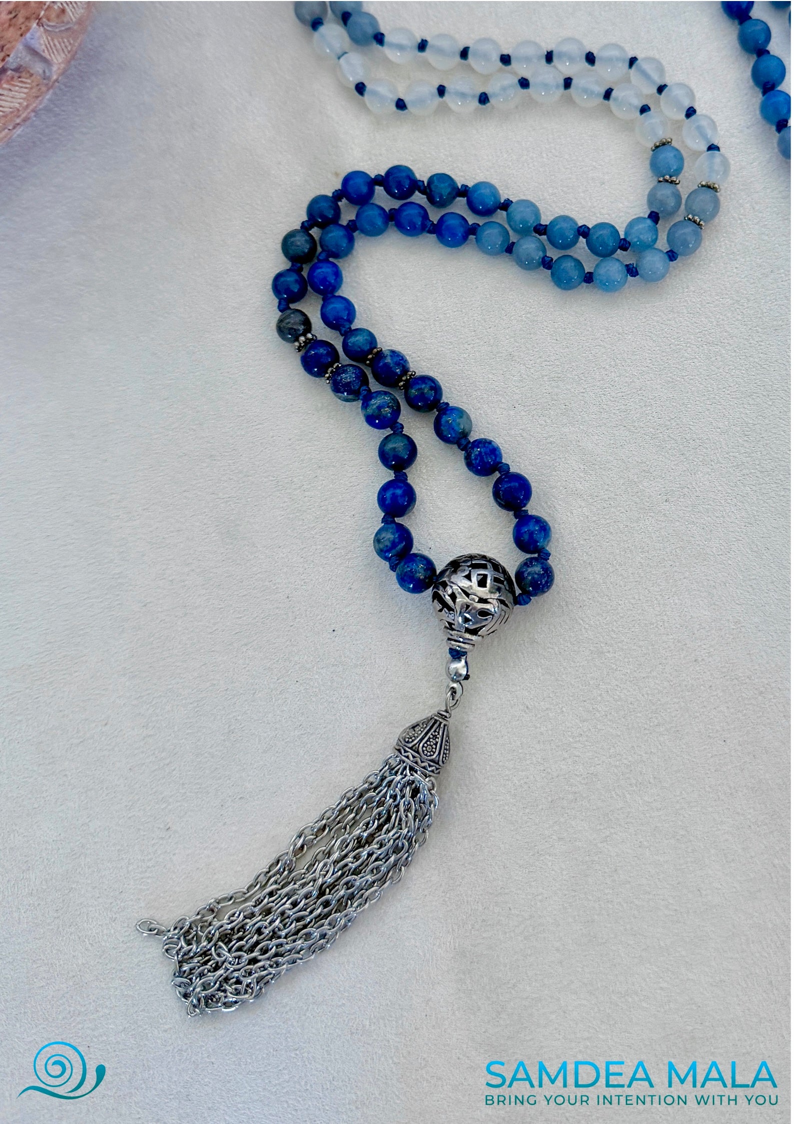 detail tassel of a Blue aventurine beads on natural gemstone mala for meditation and intention setting