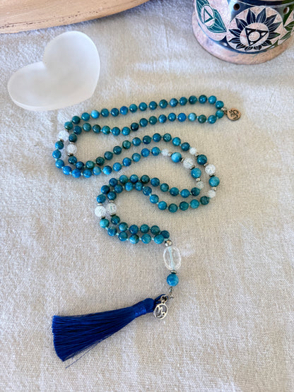 full view of handmade mala in natural apatite for self confidence and appetite regulation - custom mala beads, OM charm, blue teal spiritual mala with tassel - prayer beads for meditation and mindfulness