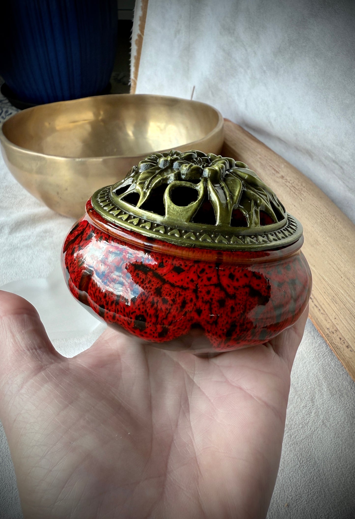 Small round ceramic bowl in deep bred glaze with a removable golden metallic lid, artisanal tabletop decor - Samdea Mala 