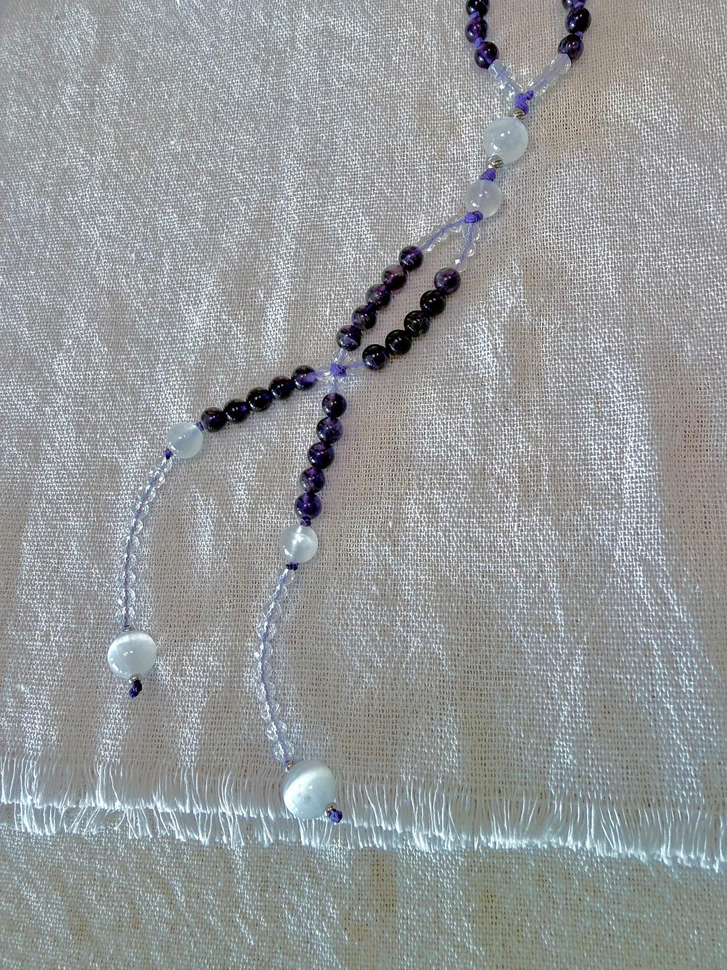 father bead and tassel of Purple Juzu with amethyst and quartz. Nichiren Buddhist prayer beads handmade with care. Nam Myoho Renge Kyo Buddist prayer beads.