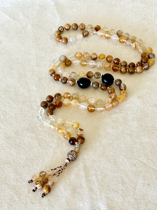 full view of 108 bead hematoid quartz and sand jasper mala for meditation with soapberry seeds and sterling silver details, handmade mala necklace by Samdea
