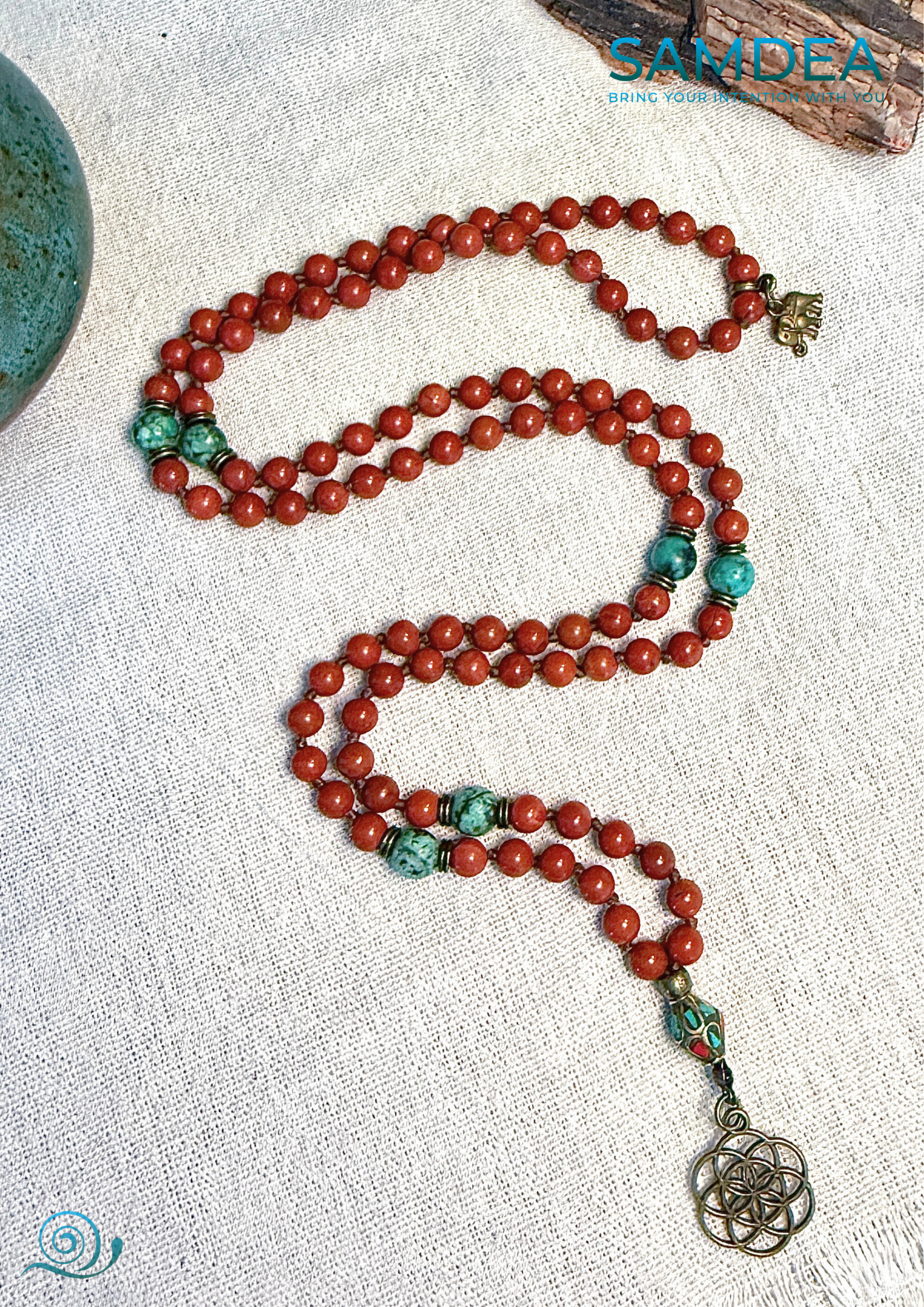 full view of Mala necklace with Red Jasper and African Turquoise, hand-knotted with 108 beads for meditation and personal growth. Spiritual jewelry for grounding, strength, and transformation. Seed f life pendant.