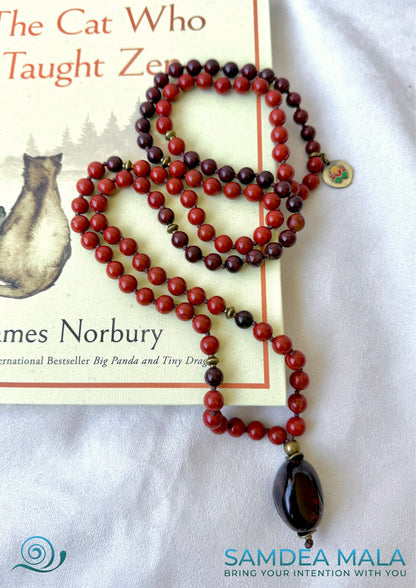 Mala for meditation with red jasper and Tiger Iron for grounding, Hanuman charm, Grounding mala necklace with 108 prayer beads, Tiger Iron pendant on spiritual mala necklace, Mala for root chakra and heart connection, Handmade mala beads for meditation and strength, hand knotted mala necklace with tiger iron pendant