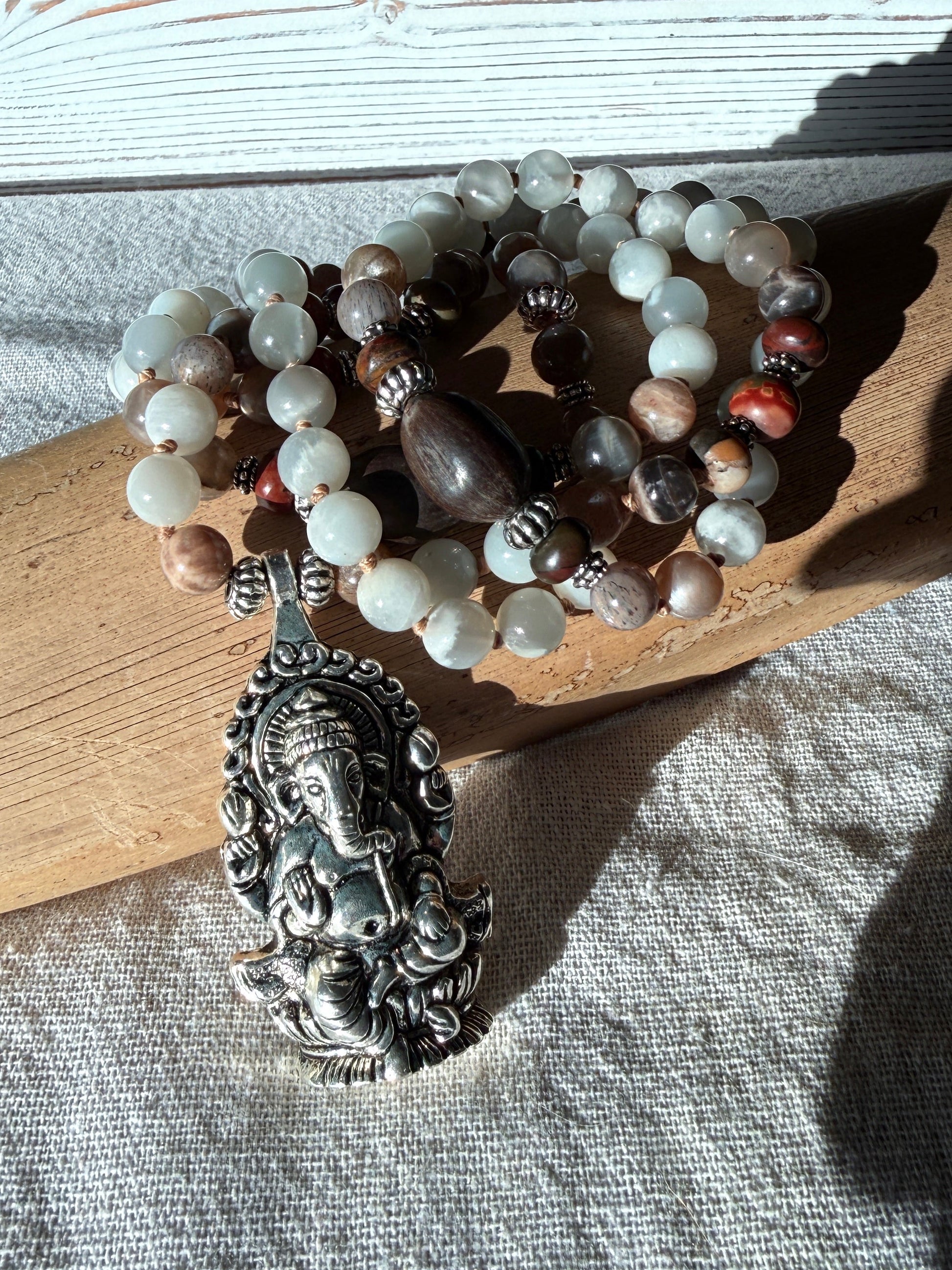 lotus seeds and Natural gemstone Ganesha mala with landscape jasper for new beginnings and wisdom. Black moonstone and gray moonstone mala for meditation and spiritual practice.
