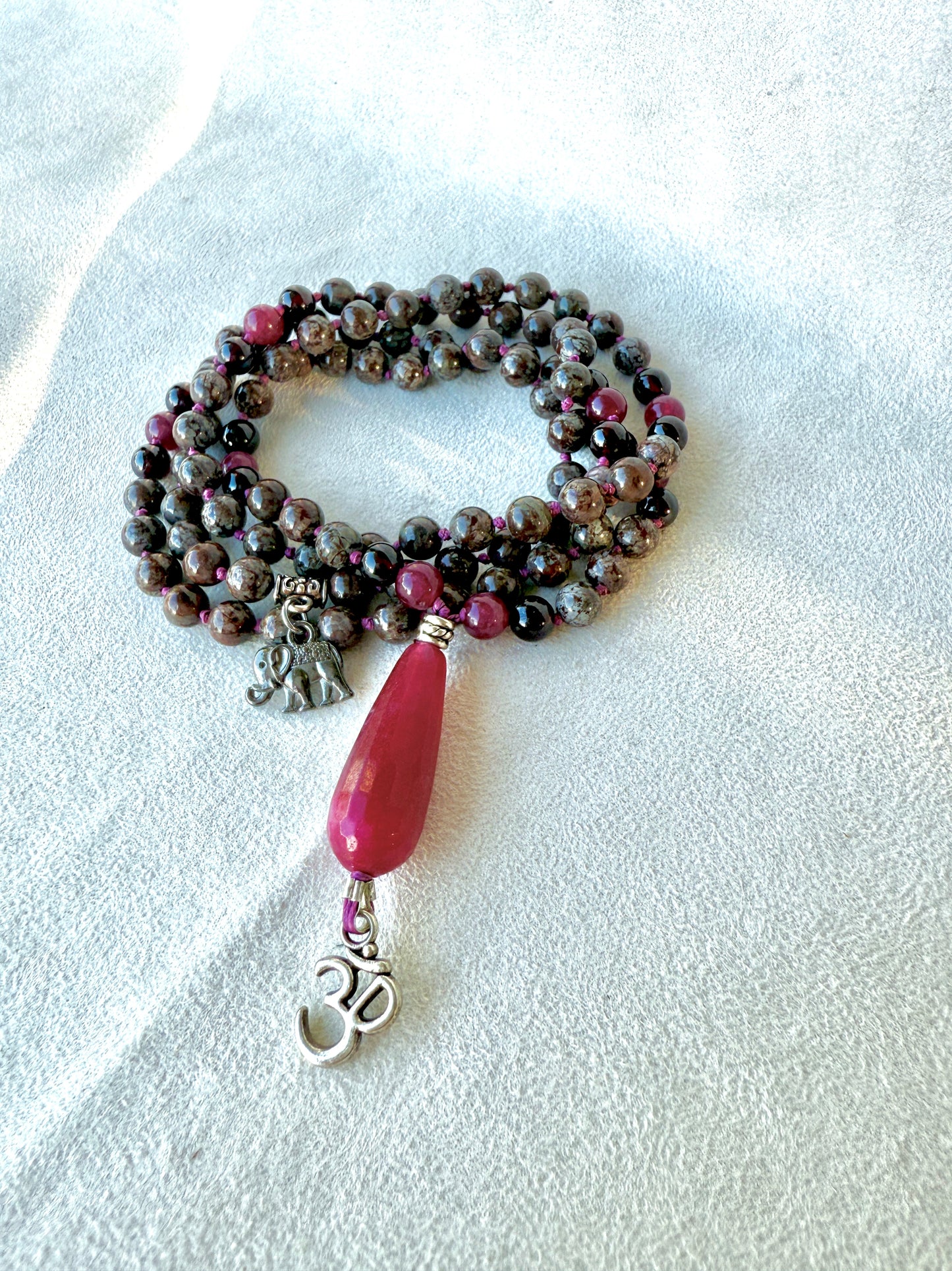 108 prayer beads coiled on altar, custom meditation mala for mindfulness practice