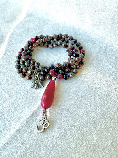 108 prayer beads coiled on altar, custom meditation mala for mindfulness practice