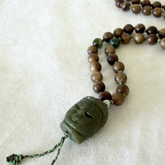 video preview of mala beads for meditation Samdea Mala with authentic sandalwood beads, Indian agate and hand-carved Jade Buddha pendant for meditation and spiritual practice