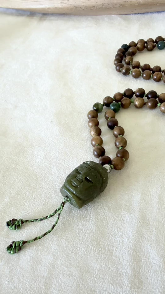 video preview of mala beads for meditation Samdea Mala with authentic sandalwood beads, Indian agate and hand-carved Jade Buddha pendant for meditation and spiritual practice