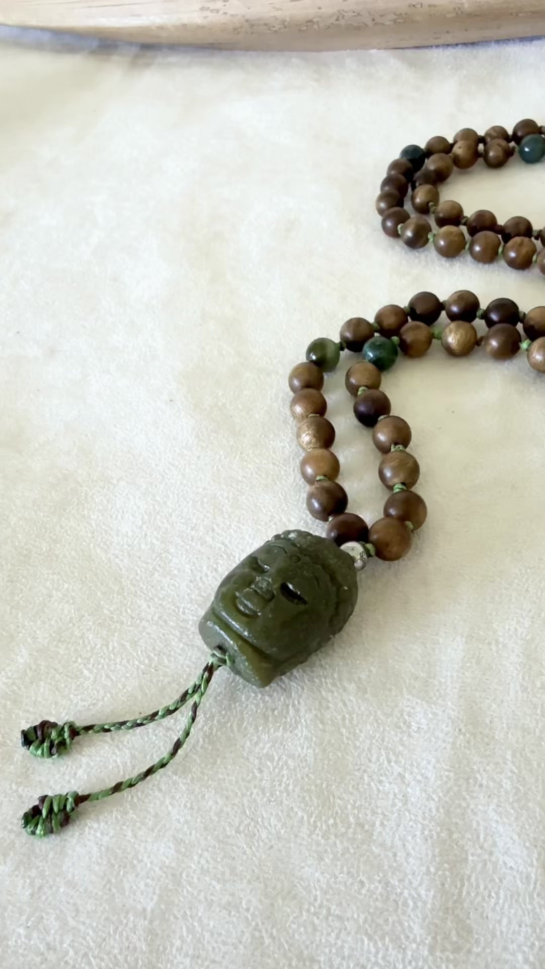 video preview of mala beads for meditation Samdea Mala with authentic sandalwood beads, Indian agate and hand-carved Jade Buddha pendant for meditation and spiritual practice