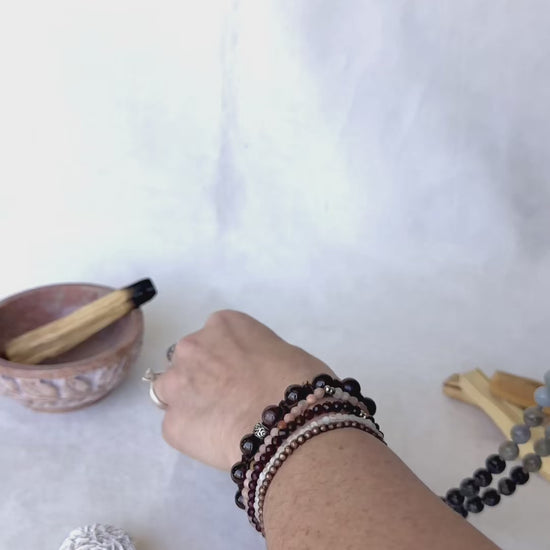 video Sacred Mala necklace in blue Aquamarine and grey Labradorite | Hand Knotted 108 Beads for Meditation and mindfulness - om charm - full view of mala for Aquarius zodiac sign