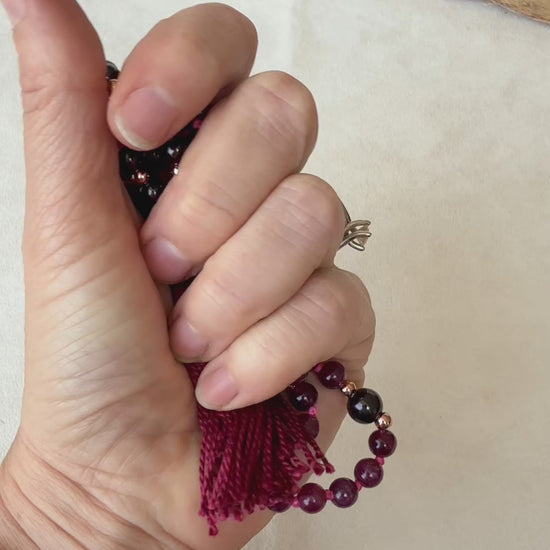 video preview of 108 garnet mala necklace for meditation and grounding