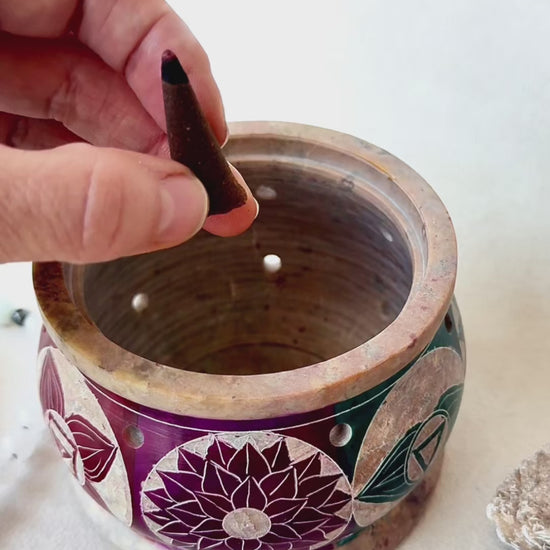 Hand-carved soapstone cone incense and resin burner, with multi-color 7 chakra design. Burning cone incense, resins, powdered incense, or charcoal discs.