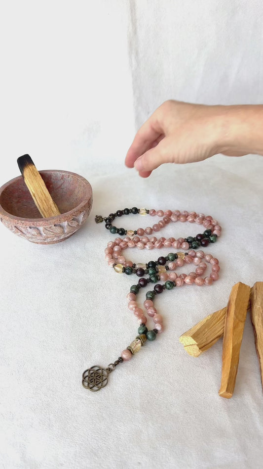 Video preview of Sun Mala for meditation with Sunstone, Citrine, Garnet, and Jasper with seed of life pendant, for energy and light in your spiritual journey of mindfullness, 108 mala necklace