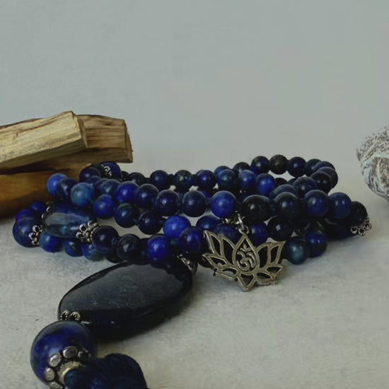 Video preview of mala necklace, 108 traditional mala in lapis lazuli, blue spiritual prayer beads with tassel and small lotus charm