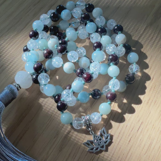 Video: mala beads in motion showing knotting and gemstone clarity