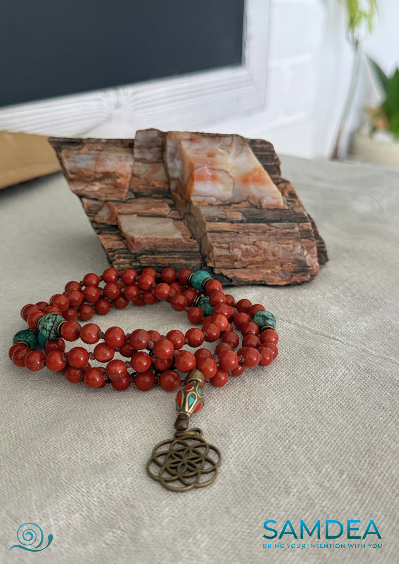 Mala for meditation with Red Jasper and African Turquoise, hand-knotted with 108 beads for meditation and personal growth. Spiritual jewelry for grounding, strength, and transformation. Seed of life pendant.