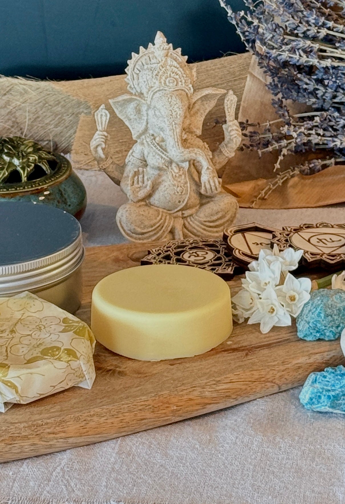 vegan body butter Samdea, organic, ethically source ingredients, natural fragrances, natural essential oil on wood with gemstones.Jasmine flowers, lavender and sandalwood.